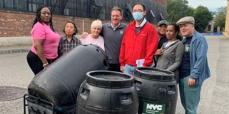 Senator Addabbo joins reprepresenatives from NYC DEP, community activist, Dorie Figliola and constituents who received a rain barrel at the event on Sunday.