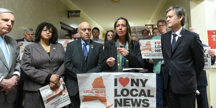 New York State Senator Monica R. Martinez discusses the importance of saving community journalism during a press conference held in Albany.