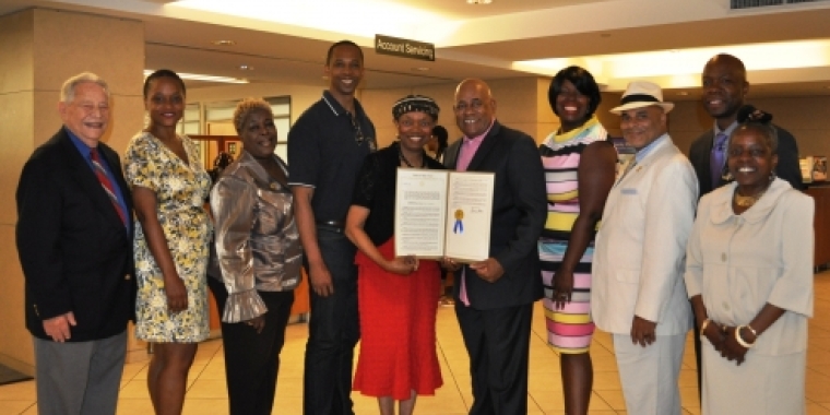 Senator Montgomery, Assemblyman Walter Mosley and Assemblywoman Latrice Walker present members of MCU’s Board of Directors with a Legislative Resolution commemorating the 100th Anniversary. 