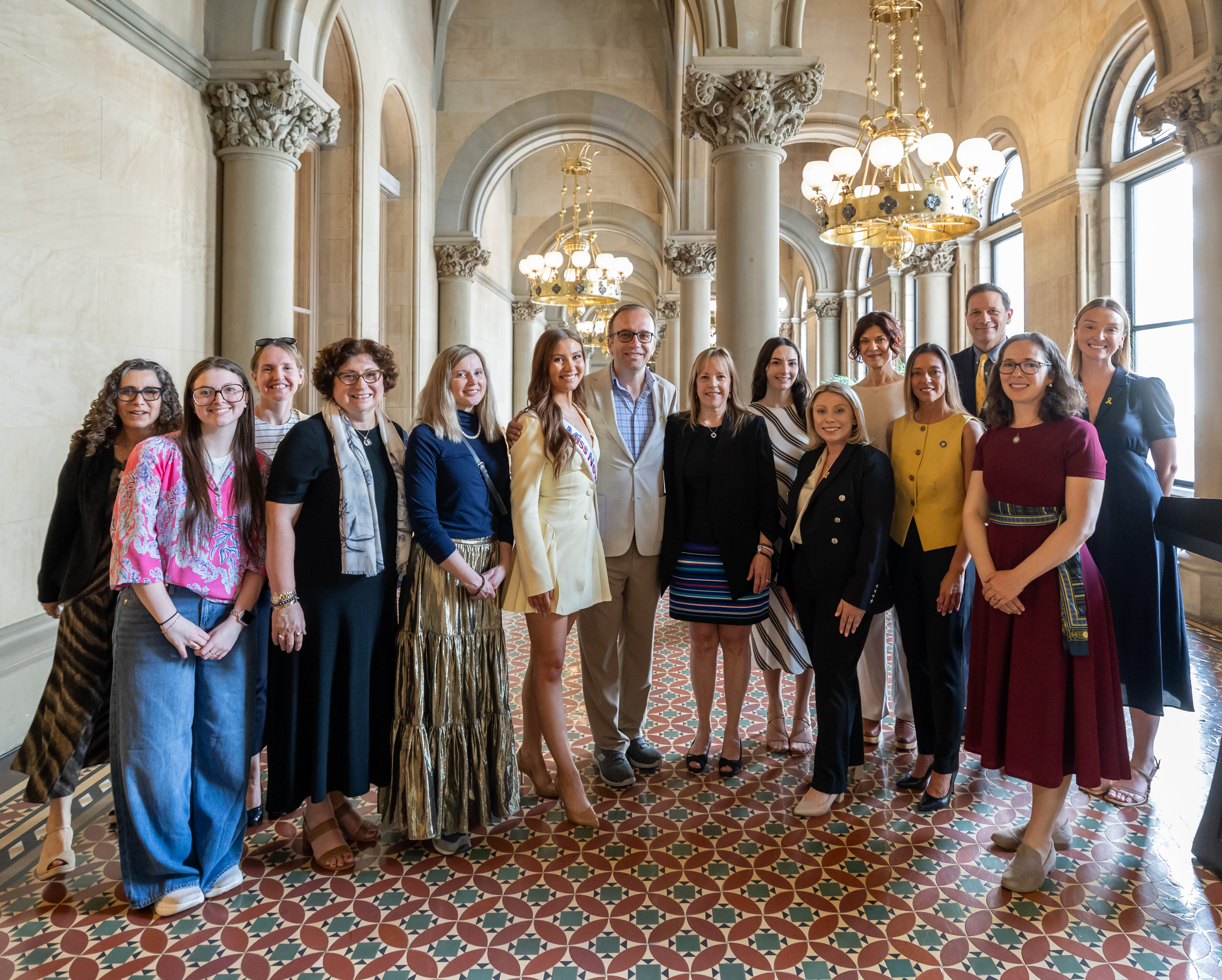 Advocates and lawmakers including Senator Monica R. Martinez and Assemblywoman Rebecca Kassay pose for photo following a May 20, 2026, rally and press conference calling on Albany to update health curriculum to covering common menstrual disorders.