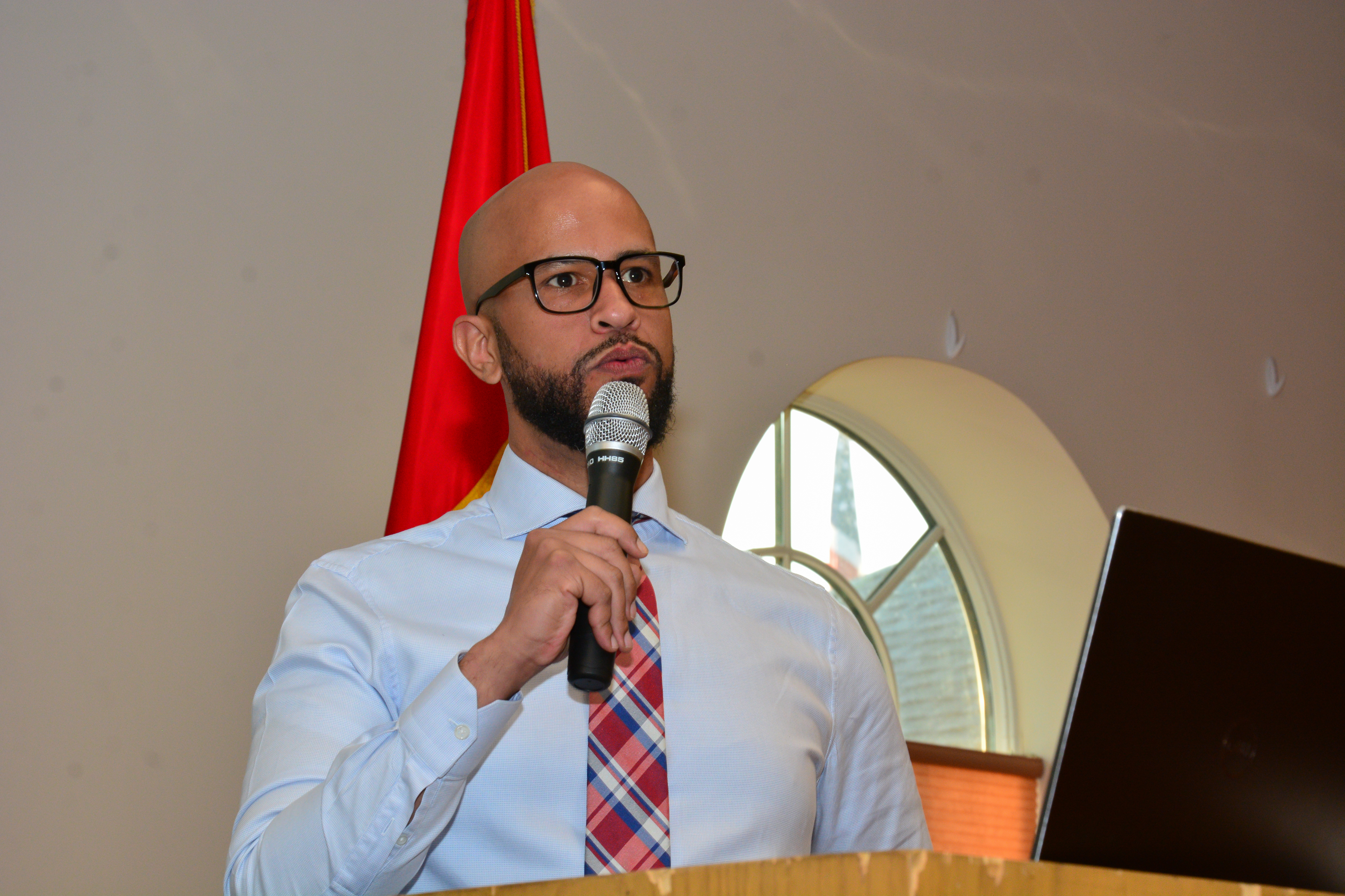 Marcos Maldonado, a principal at MTHC, Inc. gives a presentation during a grant writing workshop hosted by New York State Senator Monica R. Martinez.