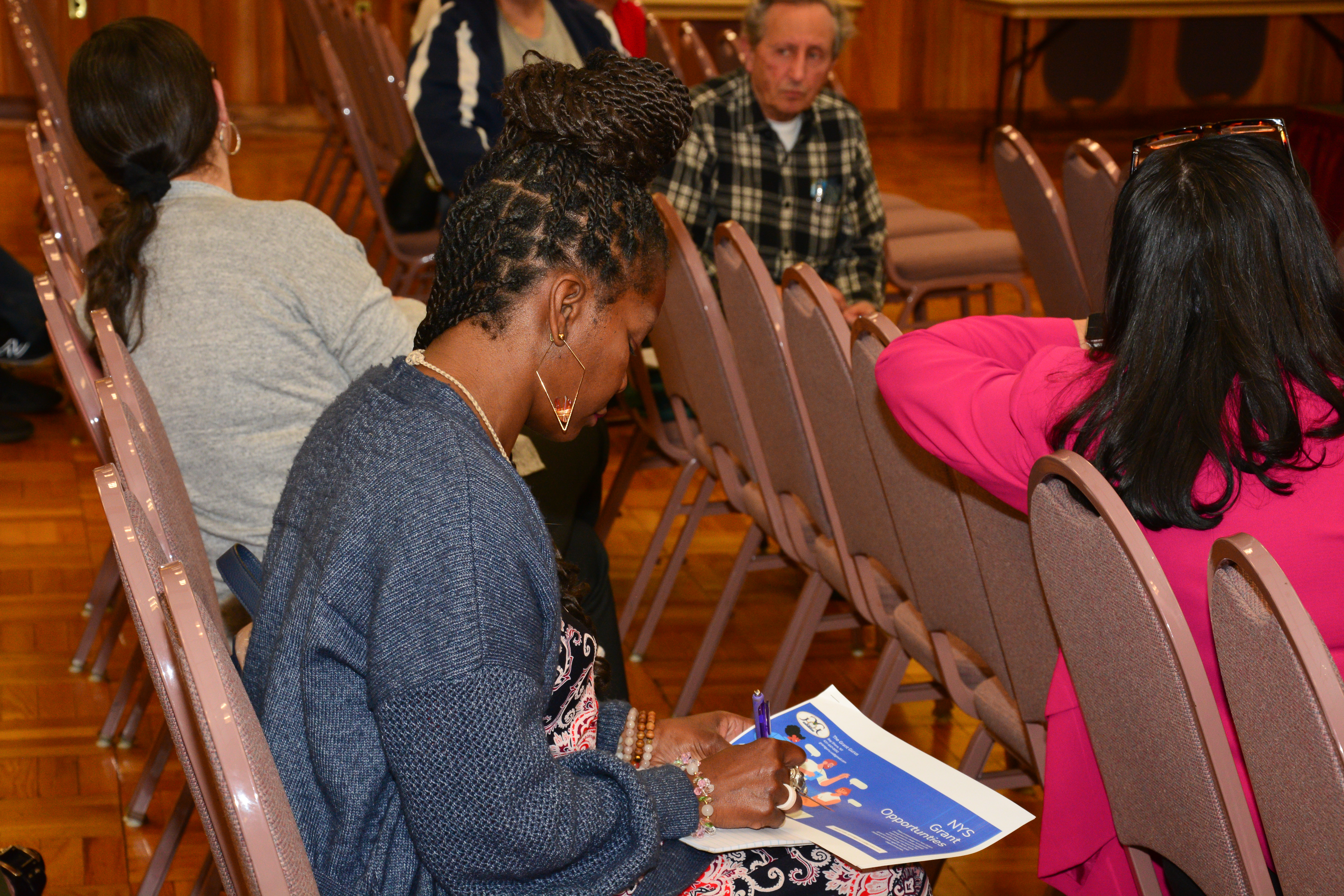 Participants of a grant writing workshop learn about New York State's grant process for not-for-profit organizations that serve local communities.