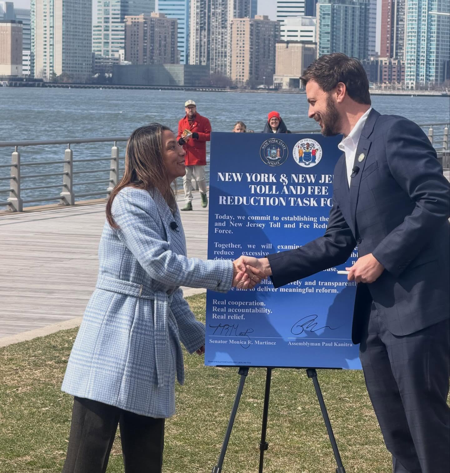 Photo (left to right): NY state Sen. Martinez shakes hands with NJ Assemblyman Kanitra after signing a pledge to continue collaboration on ways to protect motorists from overly onerous fees and fines. 