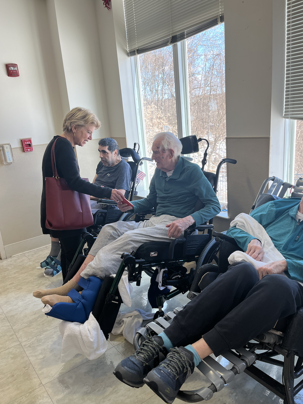 NYS Senator Shelley Mayer visits residents at the NYS Veterans Home at Montrose