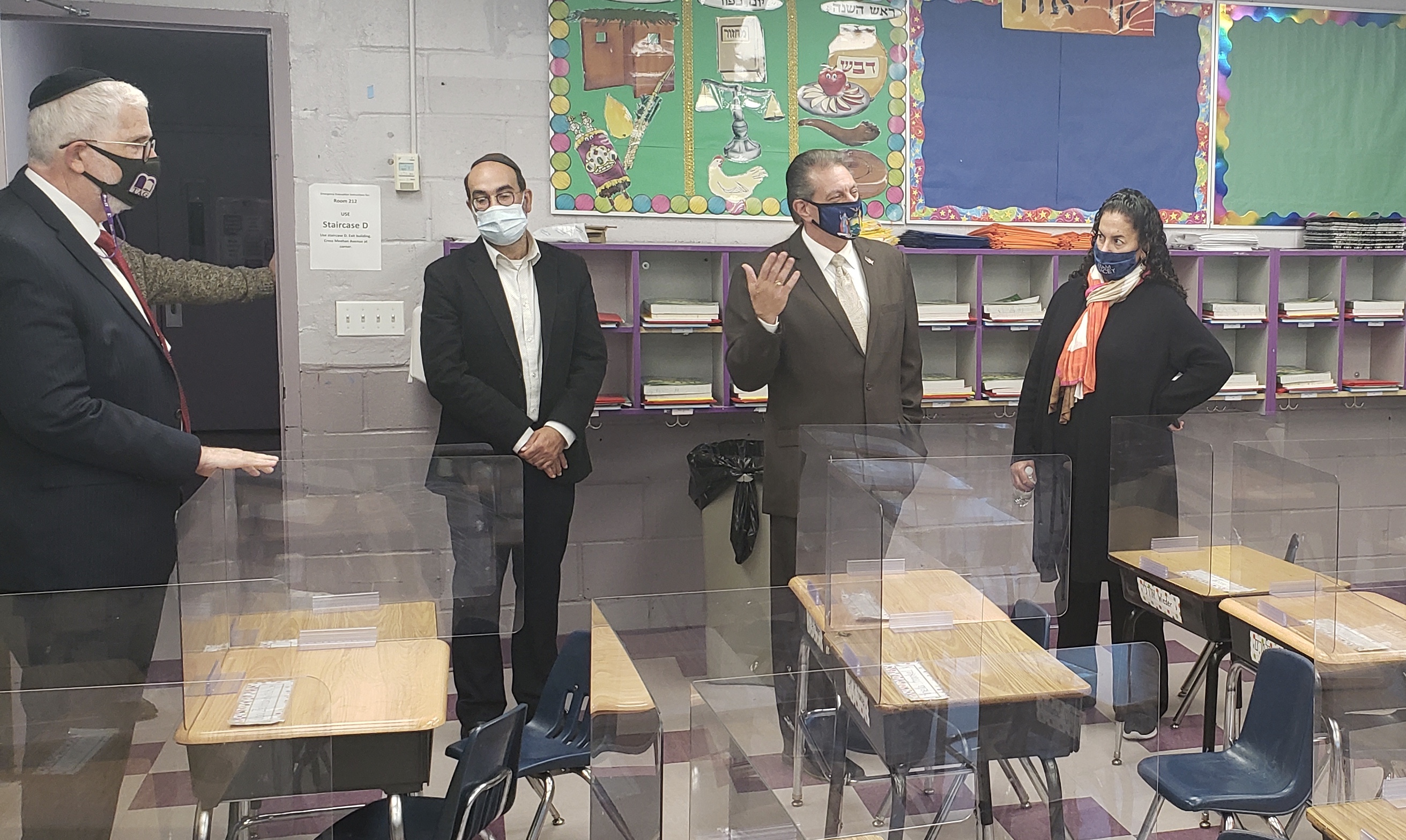 Addabbo and Pheffer Amato tour a school and synagogue in Far Rockaway