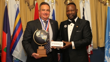 Sen. Borrello and Ambassador Sanon during the Award Presentation