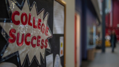A picture of a "college success" graphic on the wall of a school.