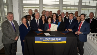 New York Governor Kathy Hochul signs the Suffolk County Water Restoration Act that was sponsored by Senator Monica R. Martinez in room of bill sponsors on May 23, 2024.