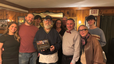 Owner Jim Rua, son Franco Rua, Caitlin, and staff at Cafe Capriccio.