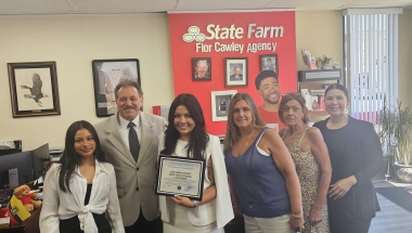 Senator Addabbo presented a citation to State Farm agent, Flor Cawley, third from left, and her staff on their fifth anniversary, and recognized Maria Gengo, second from right, for her 30 plus years with the company. 