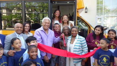 ASC Cuts Ribbon After Funding Purchase of Two Minibuses