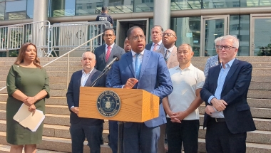 Group standing at courthouse
