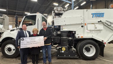 Senator Chris Ryan stands with Town of Geddes Officials to Present $250,000 for the purchasing of a street sweeper