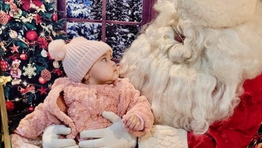  Some children looked at Santa with wonder, having seen him for the first time. 