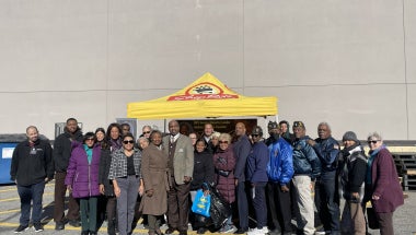 Senator Stewart-Cousins and community partners at Turkey Distribution