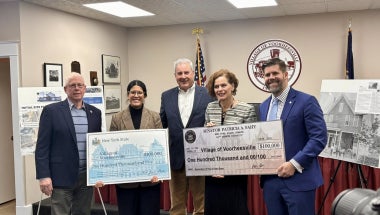 AM Romero, Sen. Fahy, with Voorheesville elected officials presenting checks for $200,000
