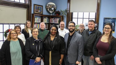 Senator April Baskin with local officials in Carnegie Library in Lackawanna, NY