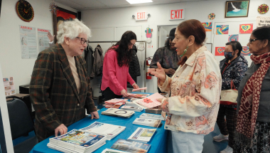 Senator Stavisky speaks with a constituent during mobile office hours.