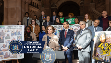 Senator Fahy with direct care workers and fellow lawmakers