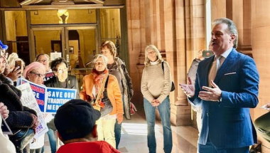 The Senator speaks at the rally.