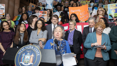 Sen. Krueger speaks at a rally to protect CLCPA