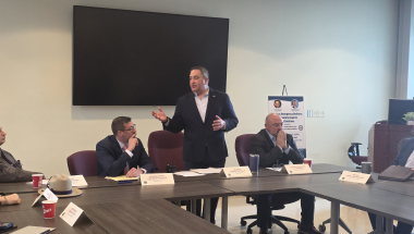 Sen Borrello speaking to a roundtable group