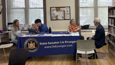 Senator Krueger Speaks with a Constituent during Mobile Office Hours