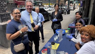 Senator Addabbo greets constituents with a free cup of lemonade.