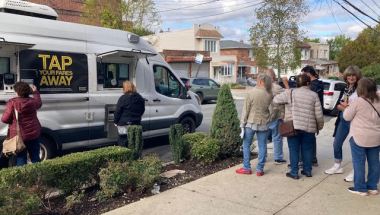 A large crowd of Senator Addabbo's constituents stopped by the OMNY card van.