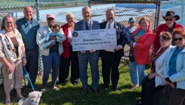 Senator Sean Ryan presents check for Riverside Park Splash Pad