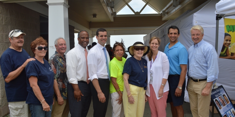 Senator Michael Venditto (middle) is pictured with (l-r) CCMAC volunteers Donald and Barbara Gleason, Dr. Steve McClain of McClain Labs, Legislator Duwayne Gregory, CCMAC volunteer Debbie Amato, CCMAC co-founder & Executive Director Colette Coyne, Dr. Erin Schoor of NYU Langone Medical Group, Dr. Scott Flugman of Dermatology Associates of Huntington and Senator Phil Boyle at the free skin cancer screening program in Tanner Park.