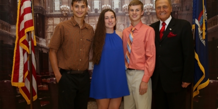 Senator Bonacic is pictured with (L-R), Valedictorian Trevor Flynn, Salutatorian Brittany Flynn, and Honored Student Matthew Kowal.