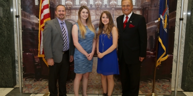 Pictured with Senator Bonacic are (L-R) Chip Yeager, Principal at Minisink Valley High School, Salutatorian Julie Cirillo, and Valedictorian Morgan Ratynski.