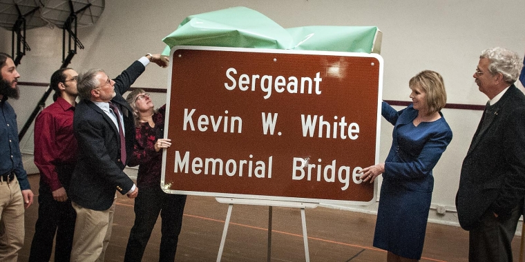 Senator Young and Assemblyman Goodell join the family of Sgt. Kevin White to unveil the sign for the “Sergeant Kevin W. White Memorial Bridge.”