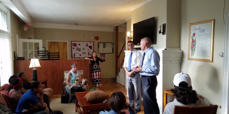 Senator Michael Venditto speaks with the residents of the “Walkabout” home in Freeport.