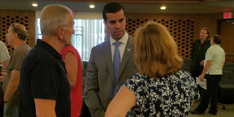 Senator Venditto speaking with Wantagh residents before the Hempstead Zoning Board of Appeals Meeting