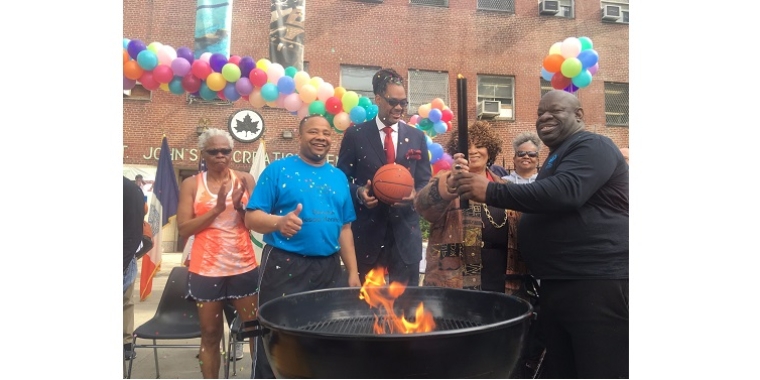 Cauldron lighting at St. John's Recreation Center with (left to right) Senior athlete Judy George, NYS Senator Jesse Hamilton, NYC Councilman Robert Cornegy, senior athlete Joyce Bolden, and St. John's Recreation Supervisor Steve Groce