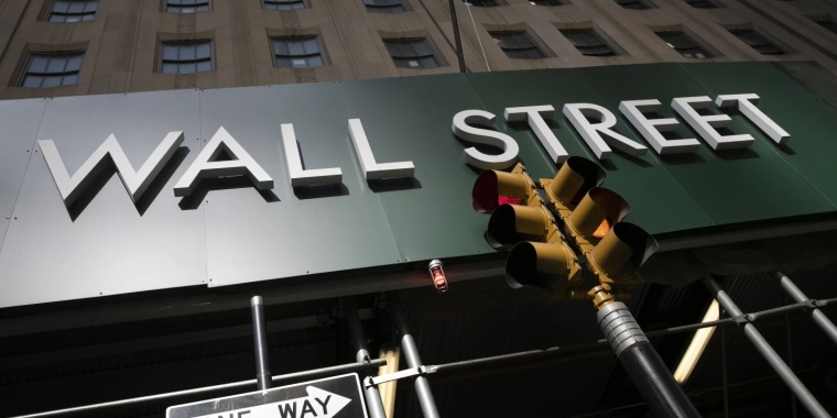 A sign for a Wall Street building is shown, Tuesday, June 16, 2020 (AP)