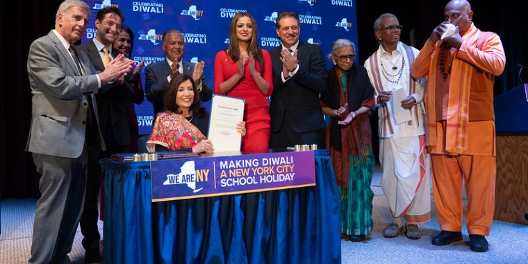 Senator Addabbo joins Governor Kathy Hochul and other elected officials and leaders as she signed the Diwali bill into law. Photo Courtesy Governor's Office