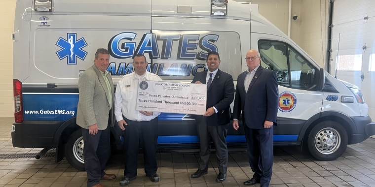 Senator Cooney Stands with Members of Gates Volunteer Ambulance Services 