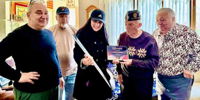 In the Dongan Hills home of Charles Navarino, from the left, Anthony Navarino, Jimmy Haynes of USIVO and the Granito-Smith American Legion Post, State Senator Jessica Scarcella-Spanton, Charles A. Navarino and John Sollazzo. (Courtesy/Office of Senator Scarcella-Spanton)Staten Island Advance