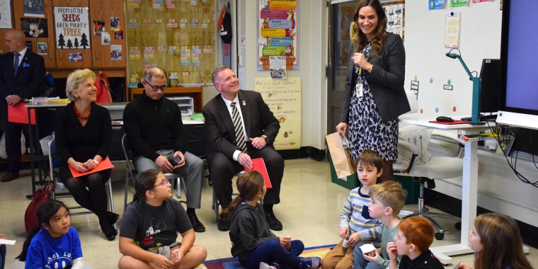 Second grade teacher Lindsay Struss demonstrates an optimistic closure to end the school day.