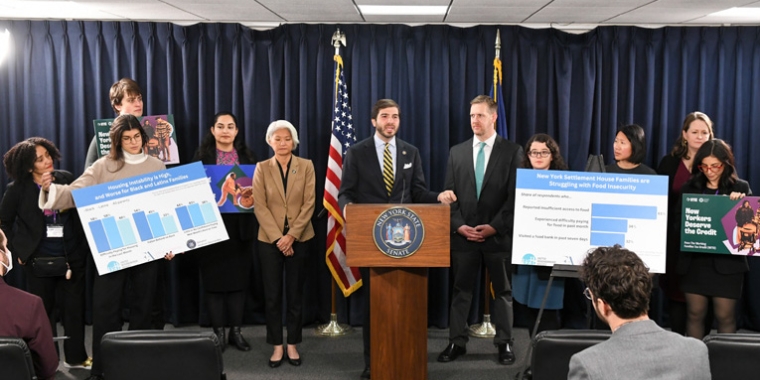 State Senator Andrew Gounardes stands with colleagues and advocates at a press event to call for the Working Families Tax Credit