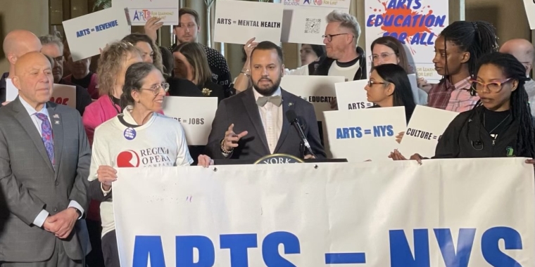 Senator Serrano standing with colleagues and arts organizations from across the state for increased arts funding