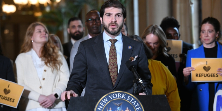 Senator Andrew Gounardes speaks at a rally in support of the I Heart Refugees Act.