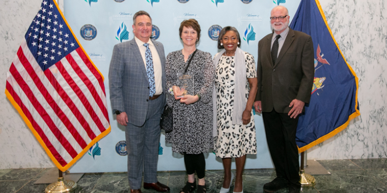 Senator Borrello, Woman of Distinction Sue Gagne, Majority Leader Stewart-Cousins and Neil Gagne