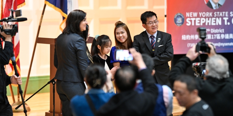 Senator Chan Celebrates Victory during swearing-in ceremony at New Utrecht High School