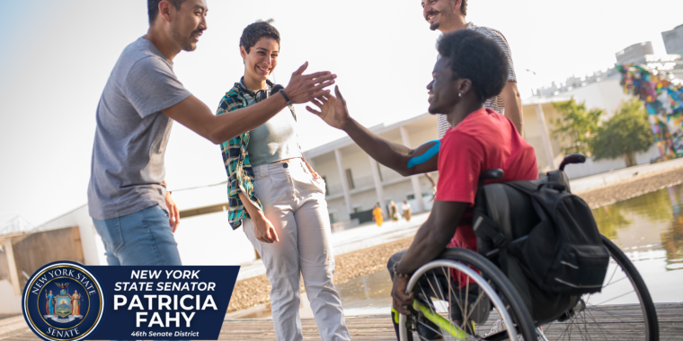 People welcoming their friend in a wheelchair