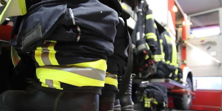 Answering the Call State Legislature Takes Up Multiple Bills Supporting Volunteer Firefighters and EMS Members This Session Photo Image of firefighter boots lined up next to a fire truck