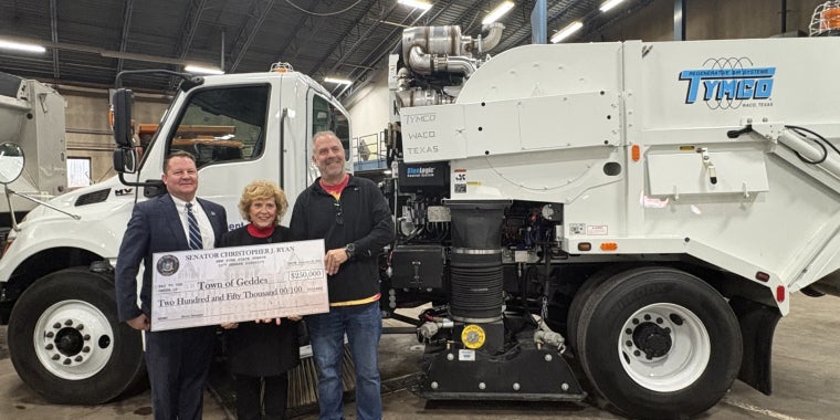 Senator Chris Ryan stands with Town of Geddes Officials to Present $250,000 for the purchasing of a street sweeper